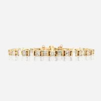 A diamond and gold bracelet