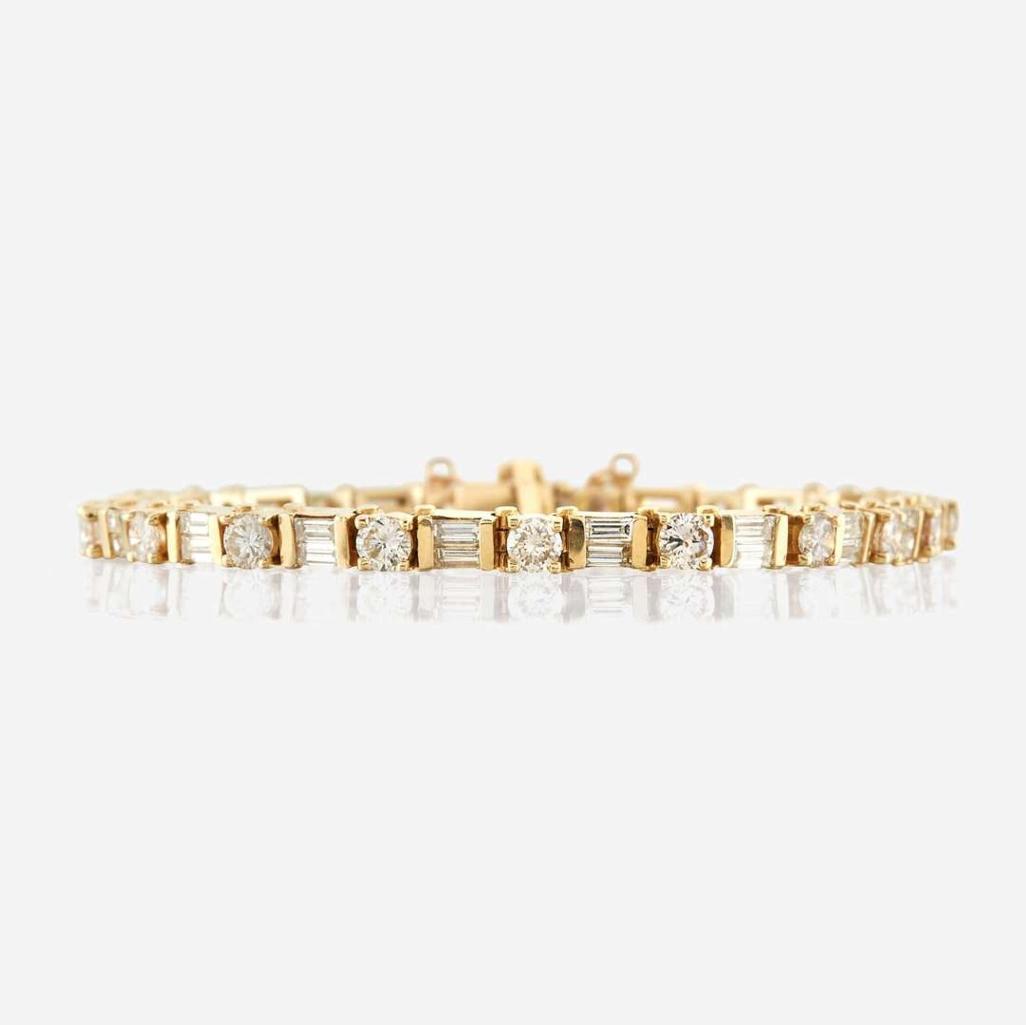 A diamond and gold bracelet