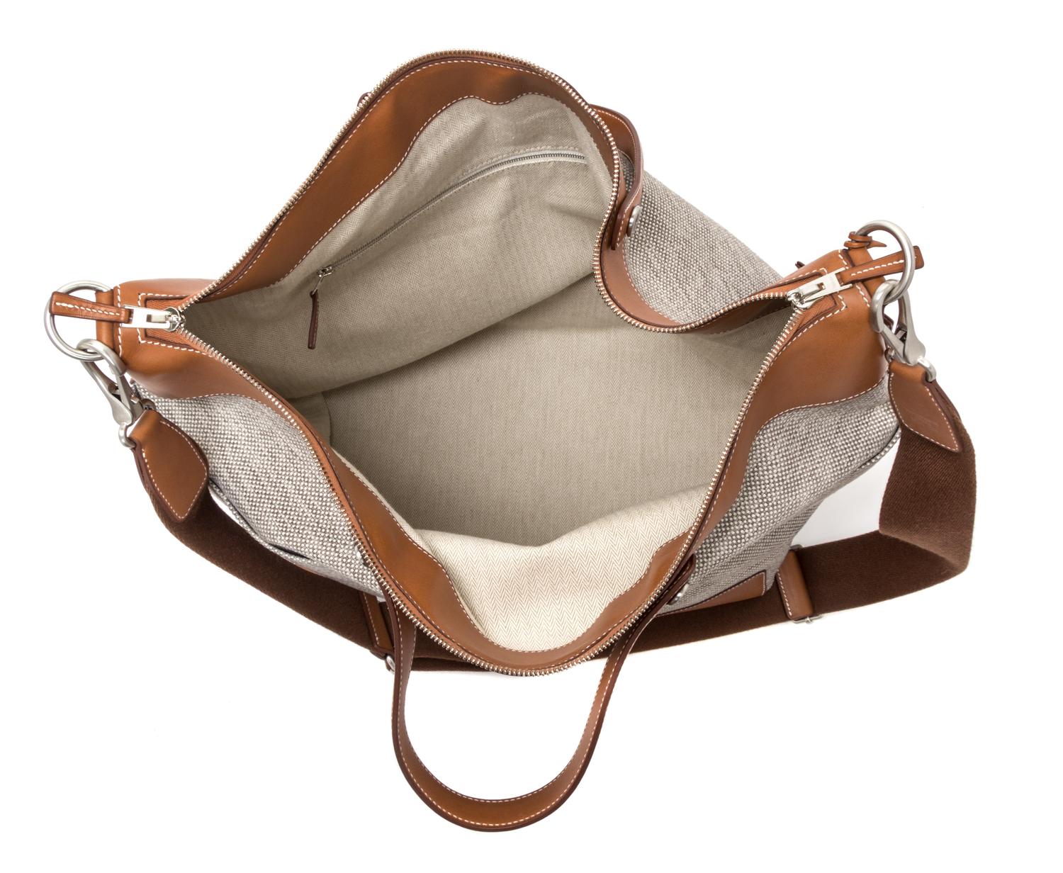 An Hermes Ecru Canvas and Fawn Barenia Calfskin Caleche-Express Medium Tote, 15.3" 14.1" 7.8".
