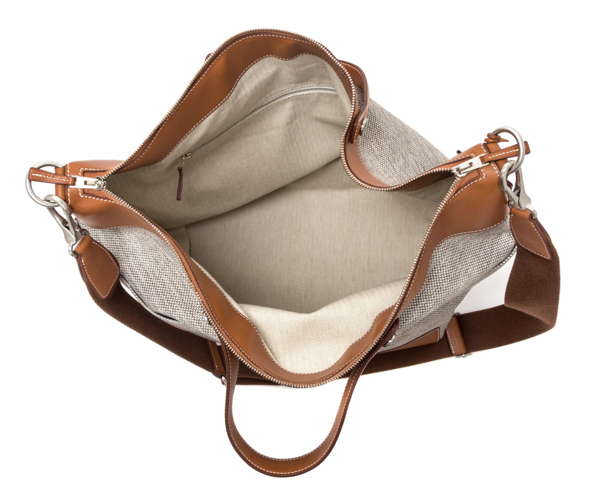 An Hermes Ecru Canvas and Fawn Barenia Calfskin Caleche-Express Medium Tote, 15.3" 14.1" 7.8".