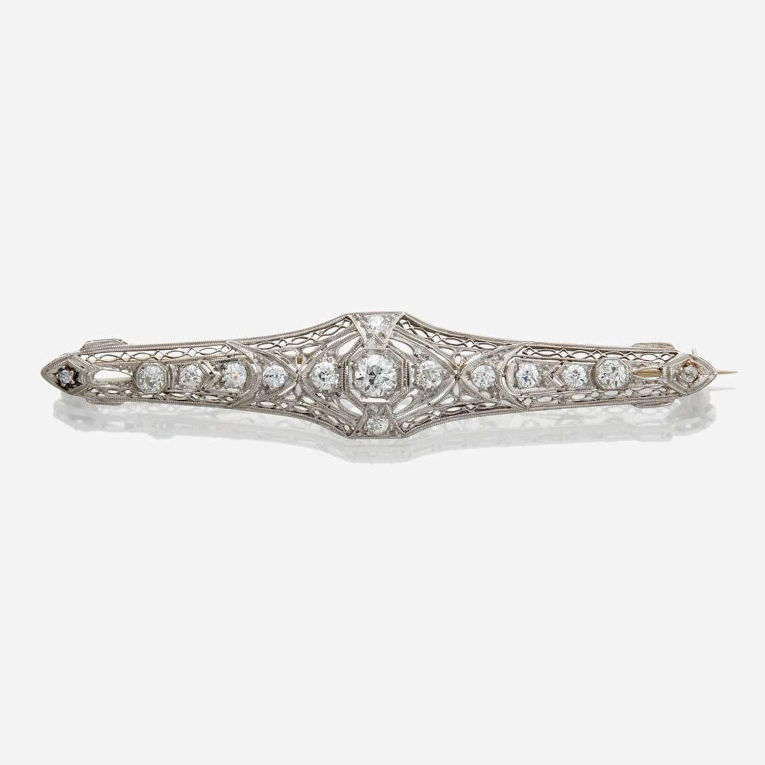 A white gold and diamond brooch