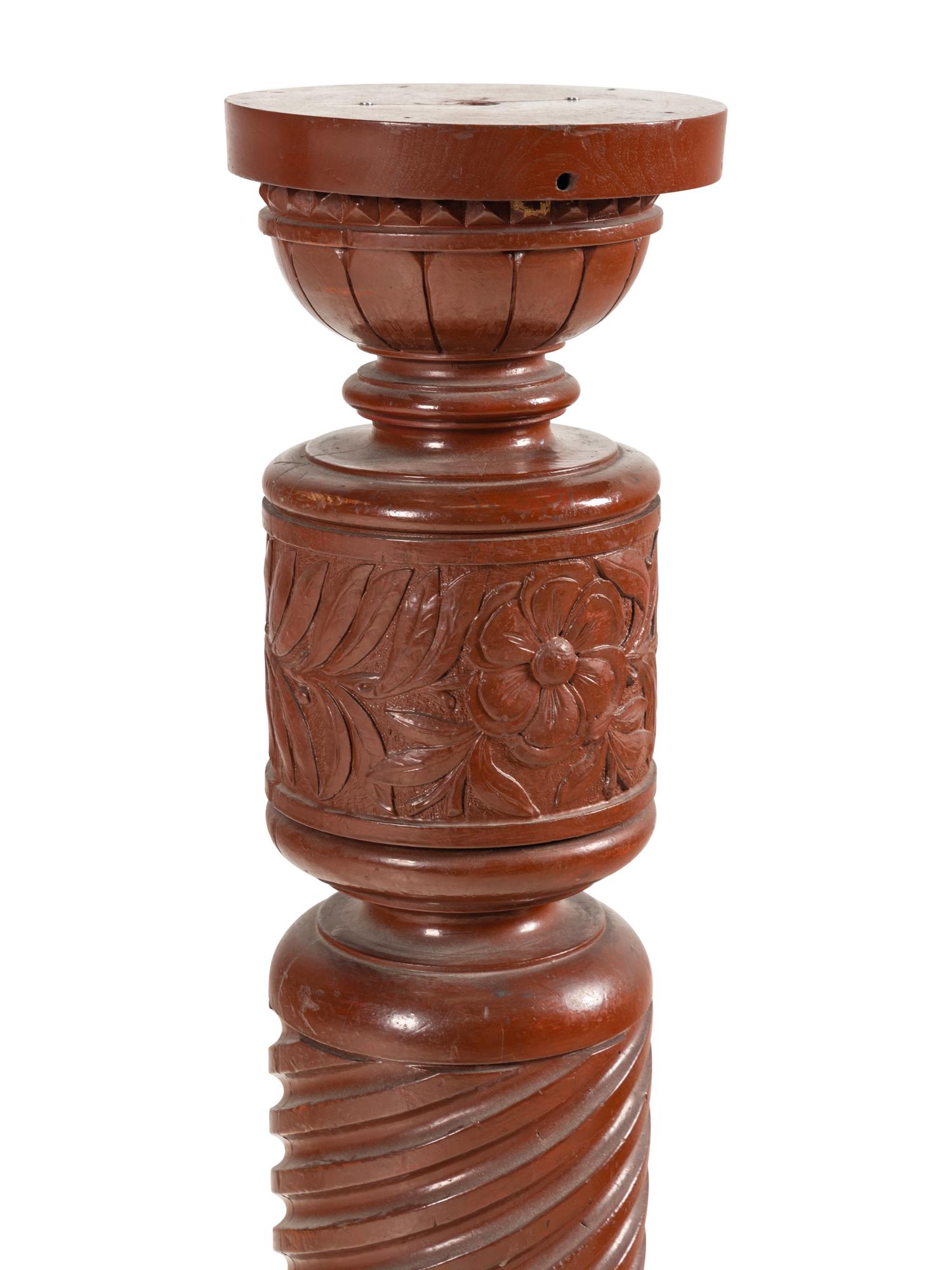 A South Asian Carved and Red-Painted Wood Pedestal