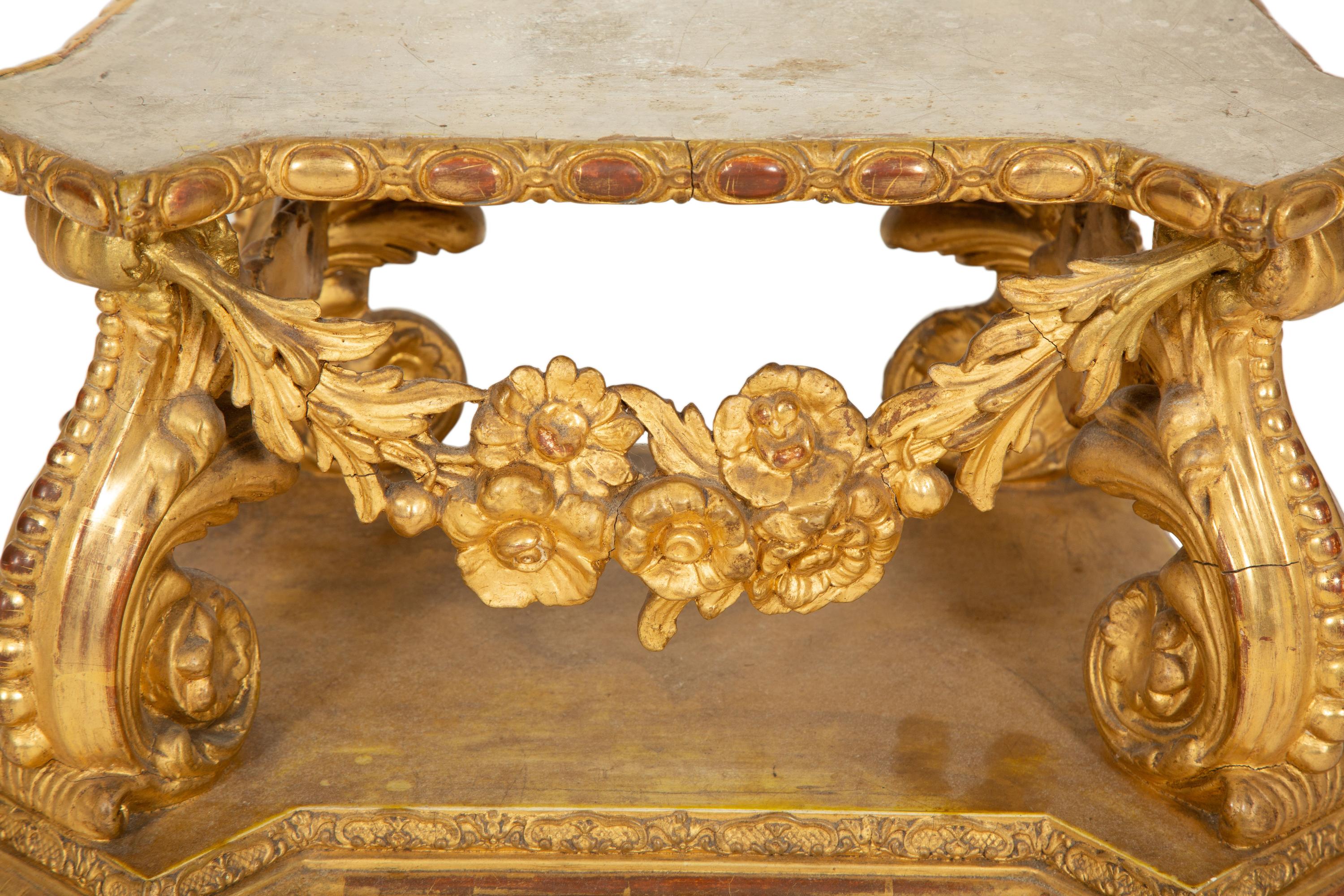A Georgian Carved, Painted and Parcel Gilt Shaped Pedestal Base
