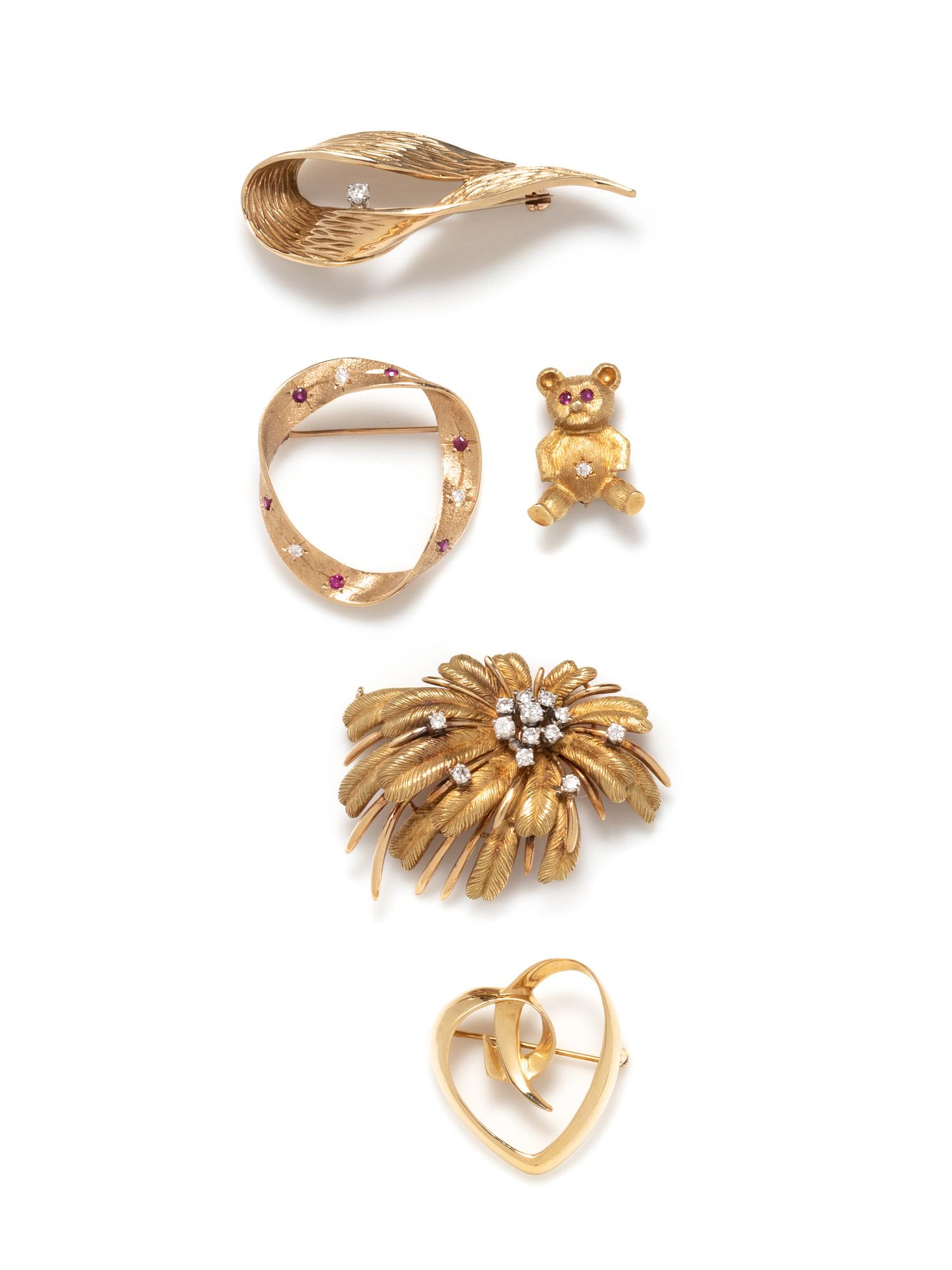 COLLECTION OF YELLOW GOLD BROOCHES