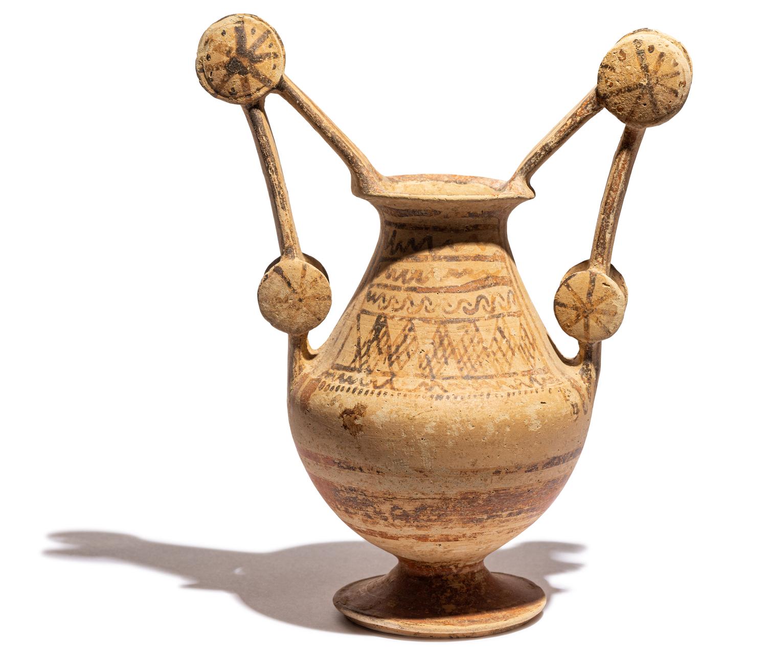 A Mesapian Painted Pottery Trozella
