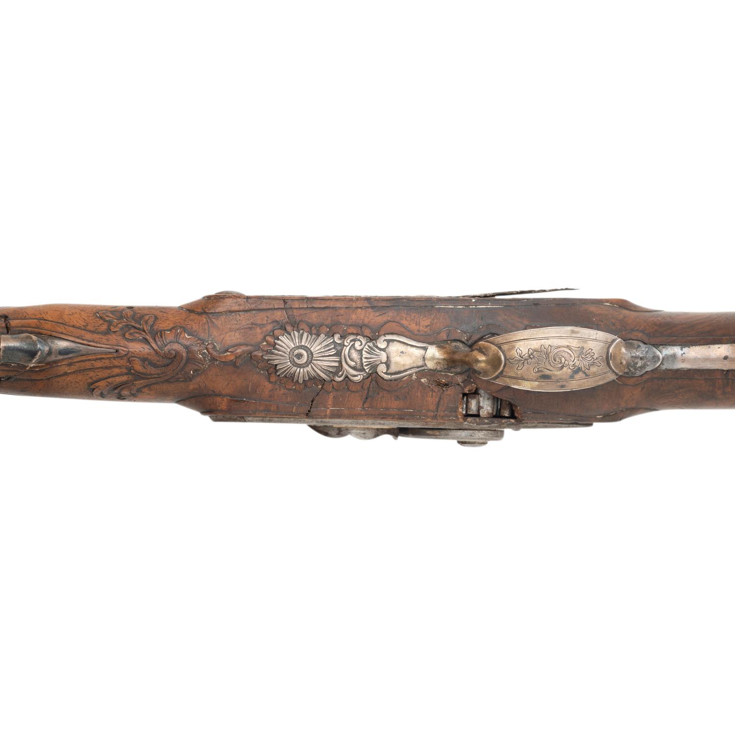 A Pair of Silver Mounted French Percussion Pistols