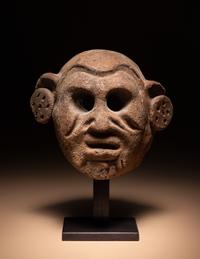 A Maya Terracotta Face Mask