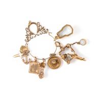 COLLECTION OF YELLOW GOLD CHARMS