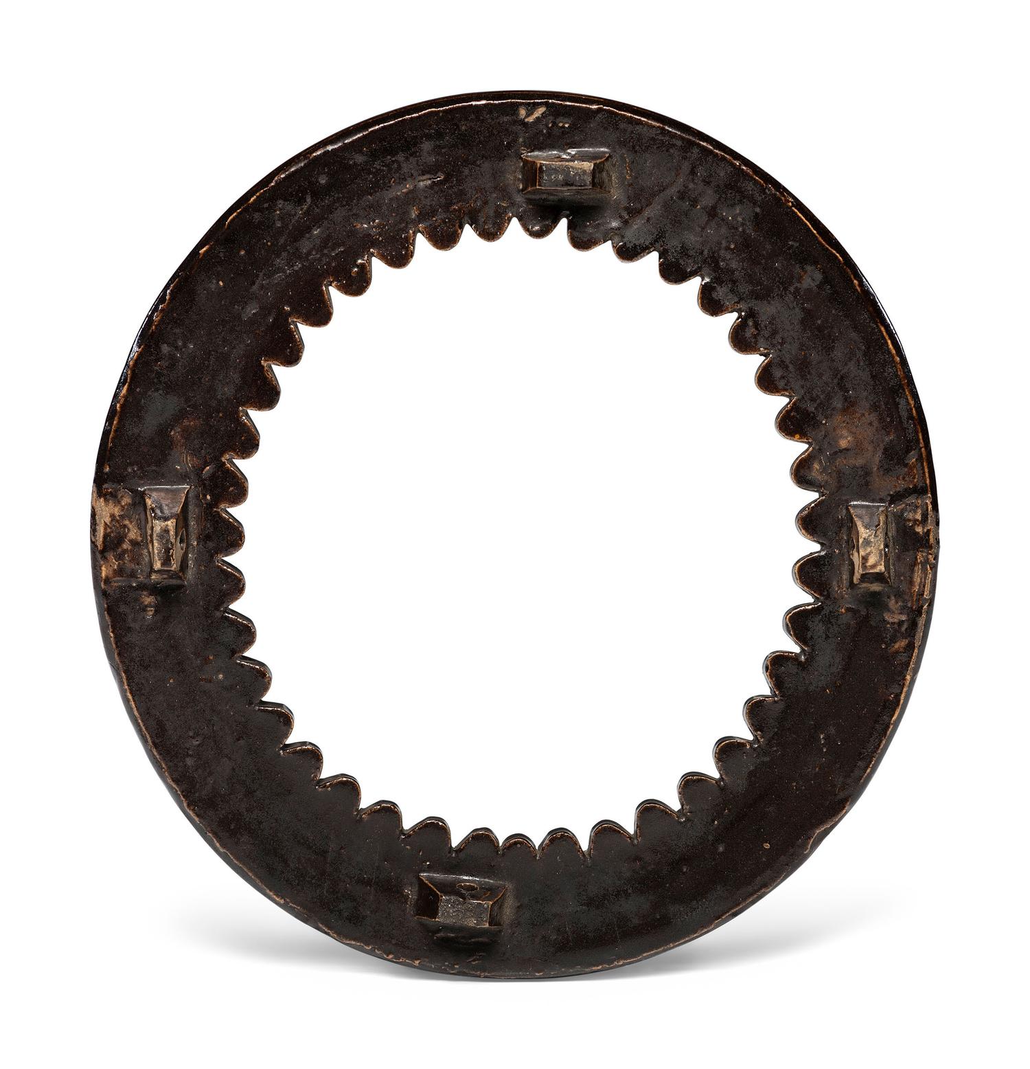 A Circular Stoneware Picture Frame in Albany Slip Glaze