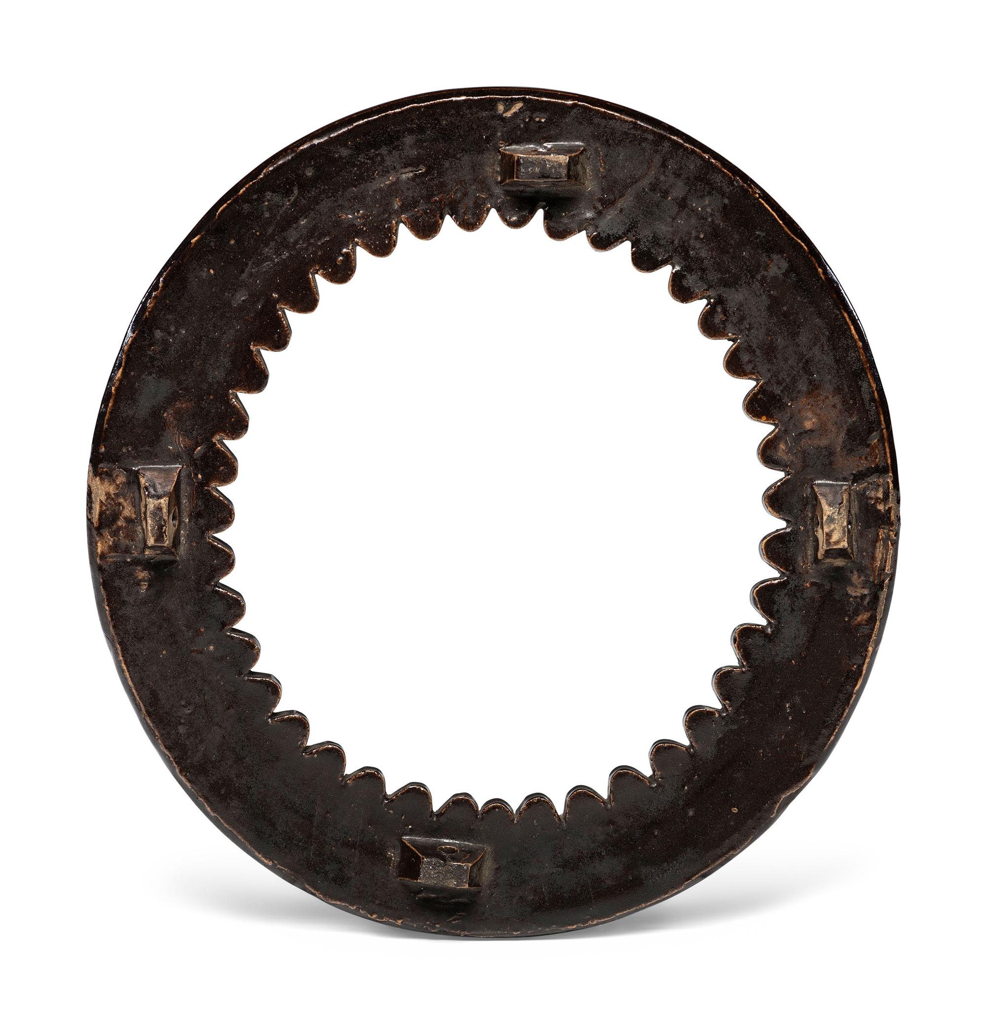 A Circular Stoneware Picture Frame in Albany Slip Glaze