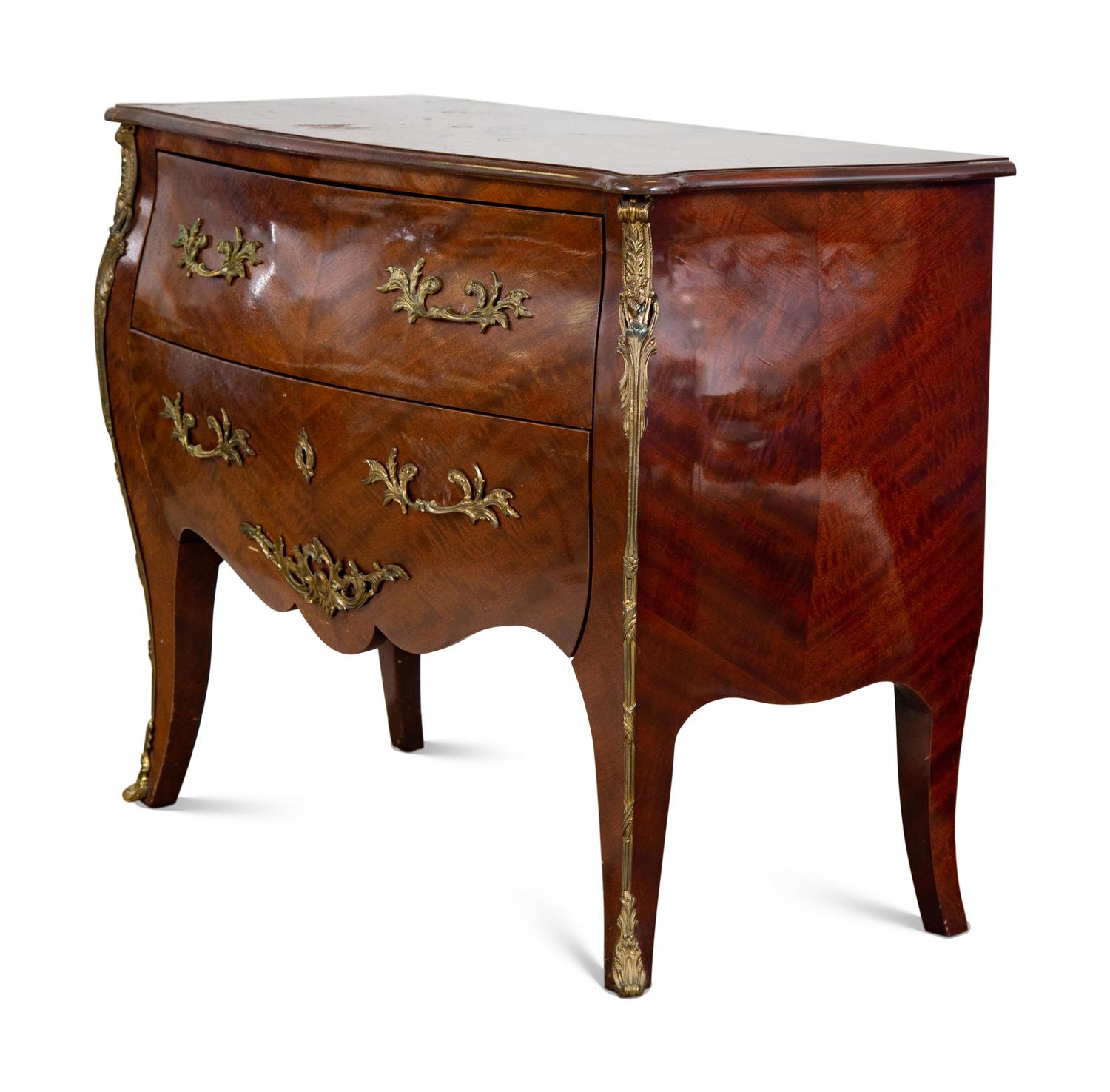 A Pair of Louis XV Style Mahogany Commodes