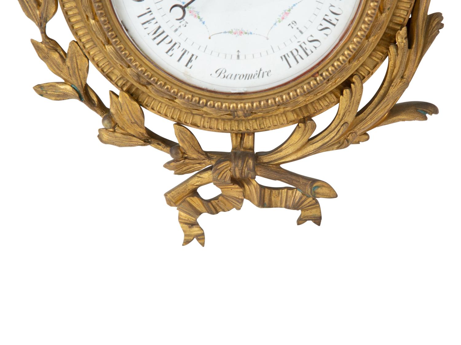 A Louis XVI Style Gilt Bronze Cartel Clock and Matching Barometer