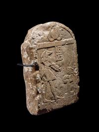An Egyptian Limestone Round-Top Stele