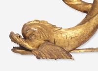 An English Carved Giltwood Transom Ornament