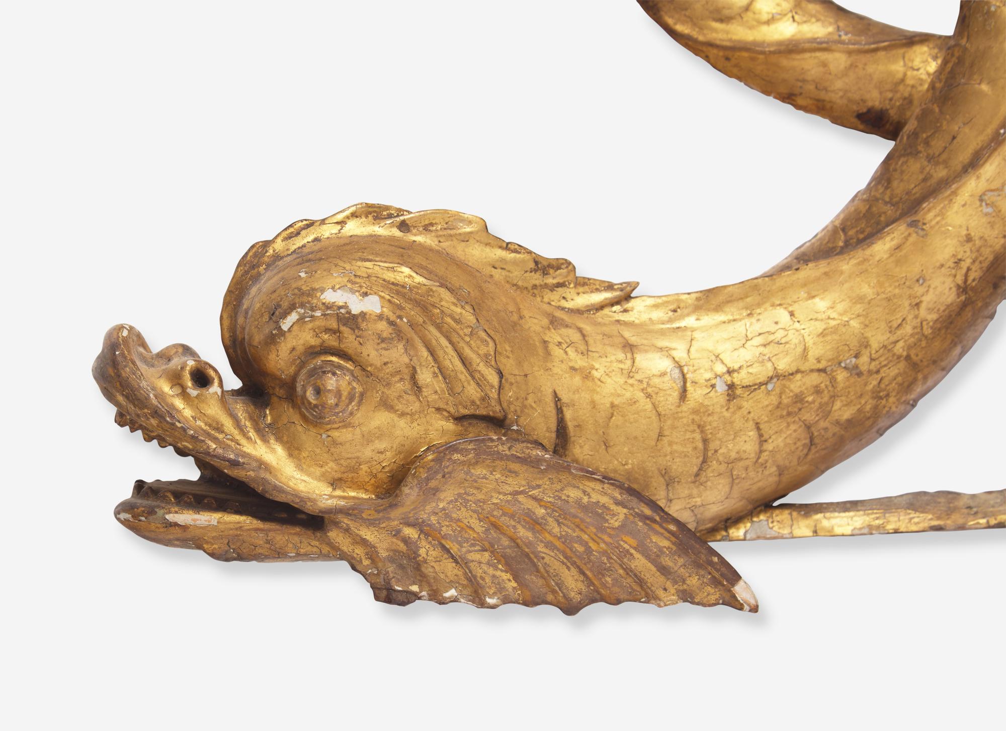 An English Carved Giltwood Transom Ornament