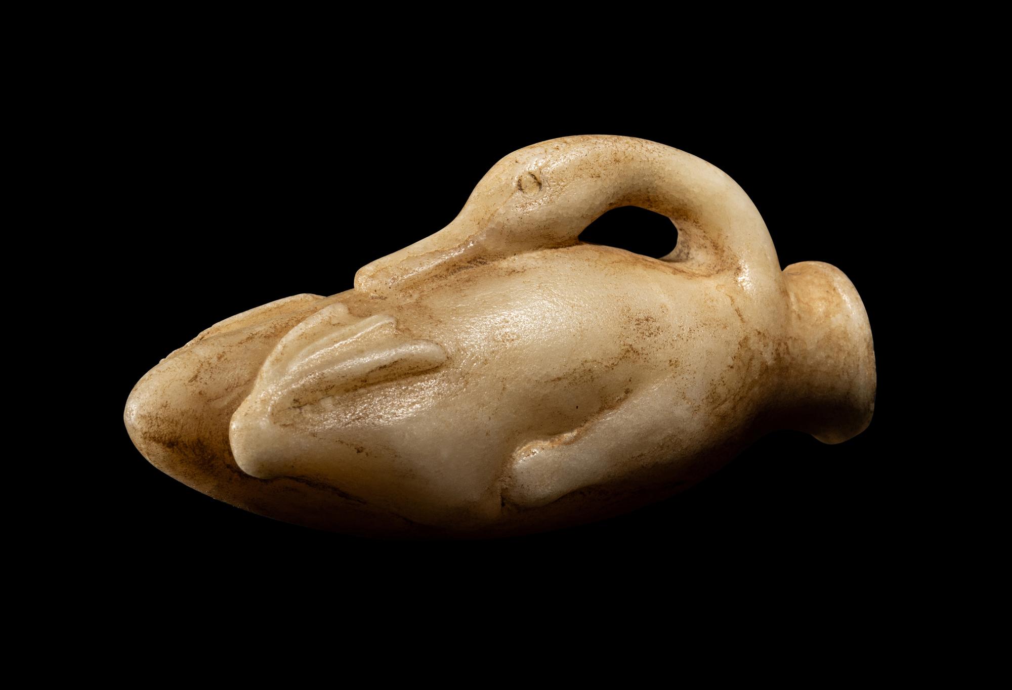 An Egyptian Alabaster Duck Cosmetic Vessel
