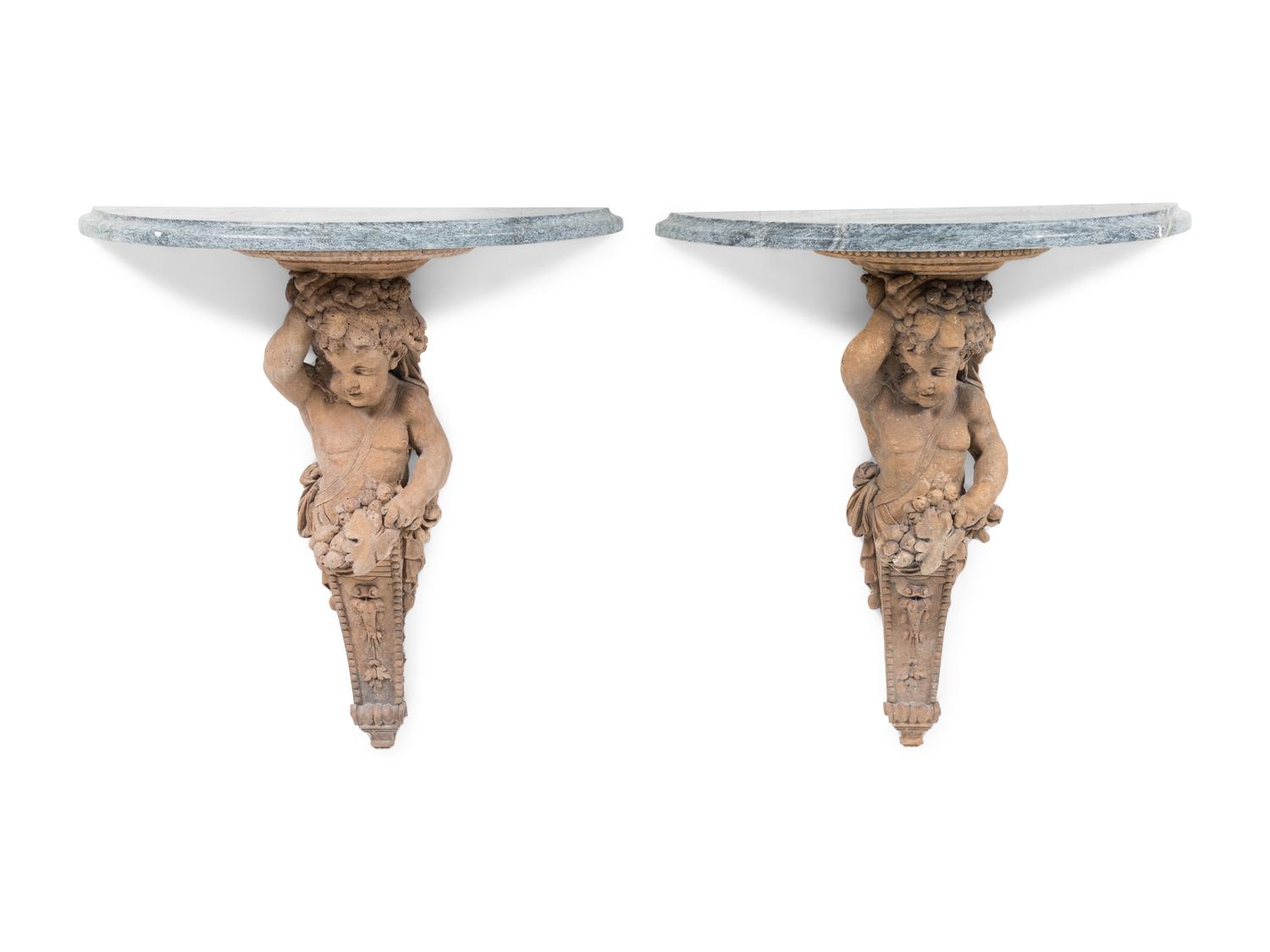 A Pair of French Cast Stone Consoles d'Appliqué with Stone Tops