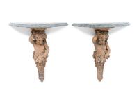 A Pair of French Cast Stone Consoles d'Appliqué with Stone Tops