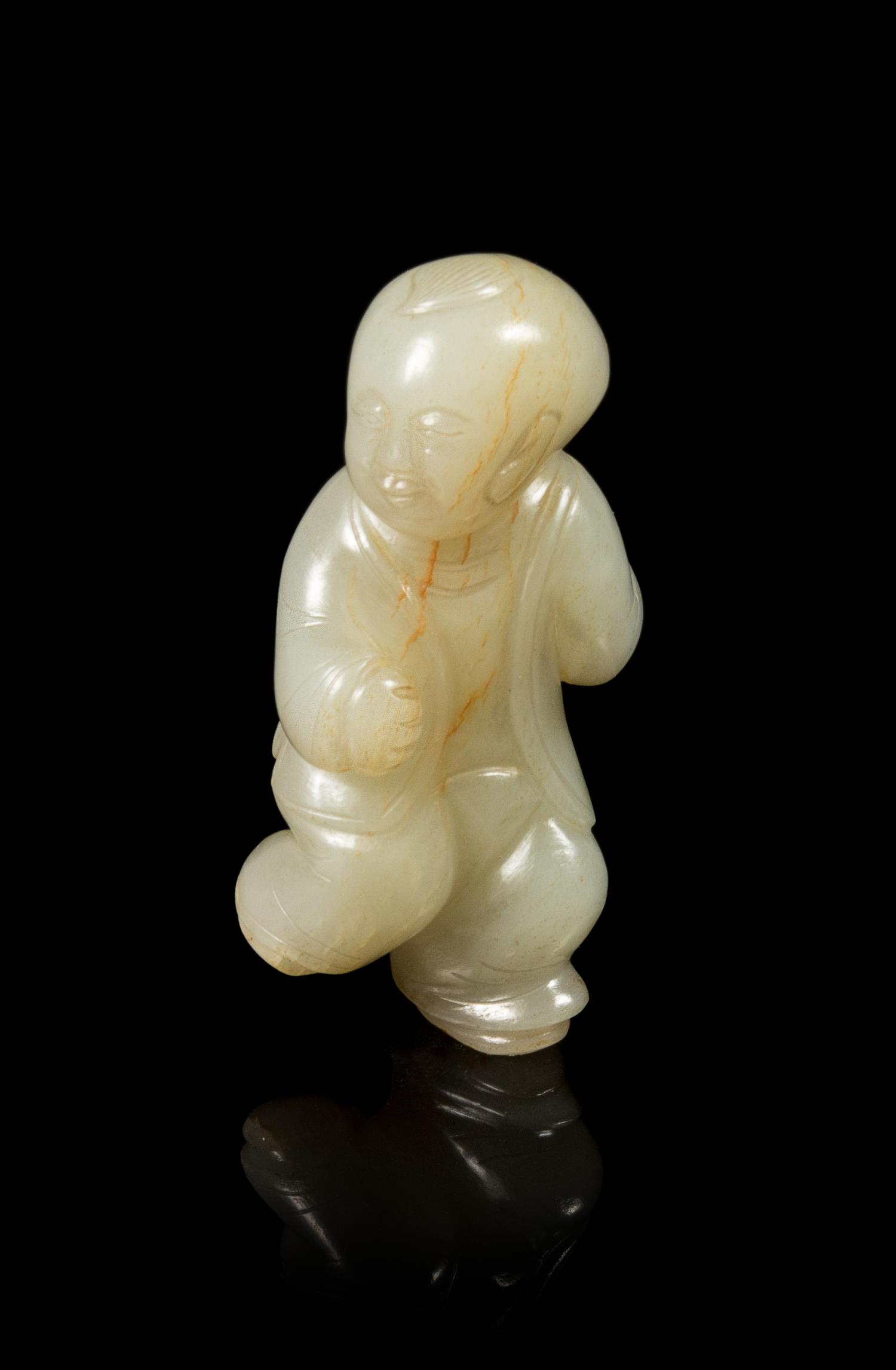 A Celadon Jade Figure of a Boy Height 2 7/8 inches. — 18TH/19TH CENTURY