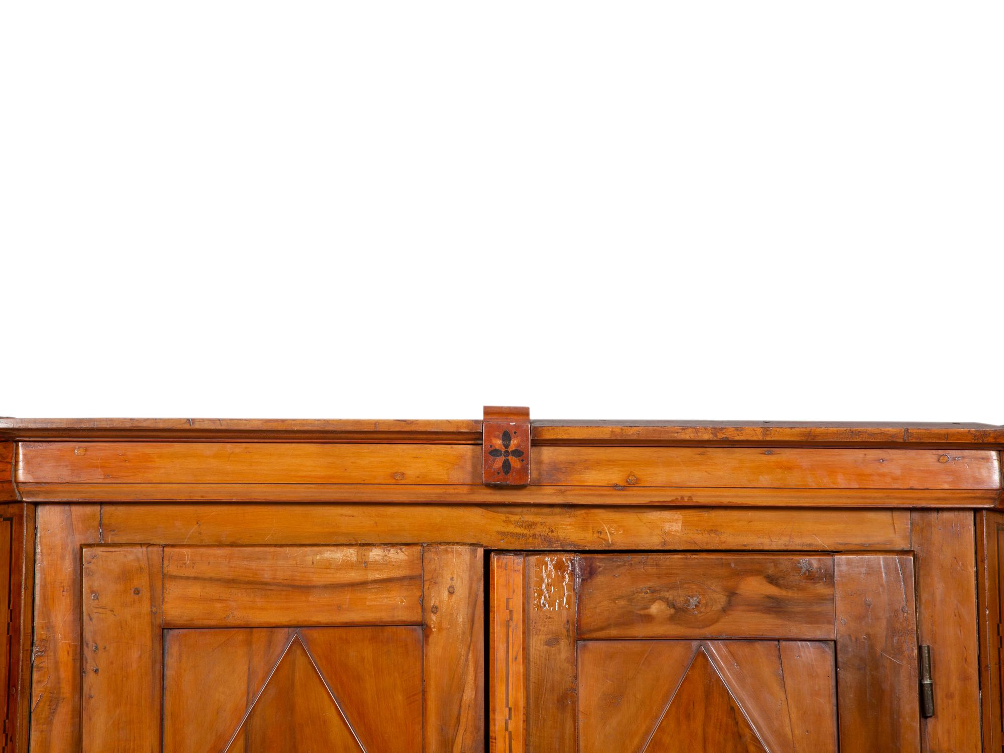 A Continental Olivewood Armoire