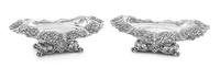 A Pair of American Silver Bowls, Tiffany & Co., New York, NY, each of oval form, the downturned border worked to show grape clusters an