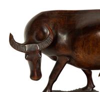 A Carved Wood Bull Sculpture