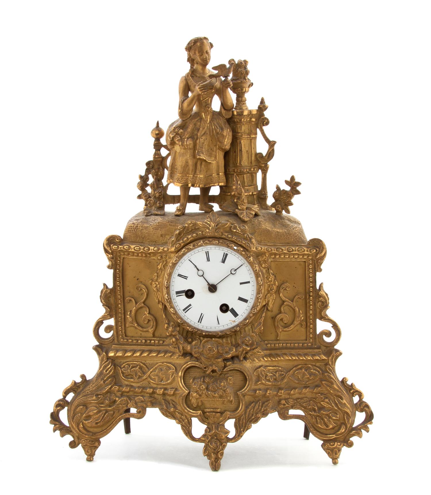 A French Gilt Bronze Figural Mantel Clock, Height 16 1/4 inches.