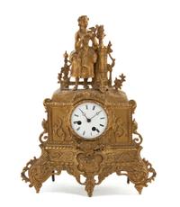 A French Gilt Bronze Figural Mantel Clock, Height 16 1/4 inches.