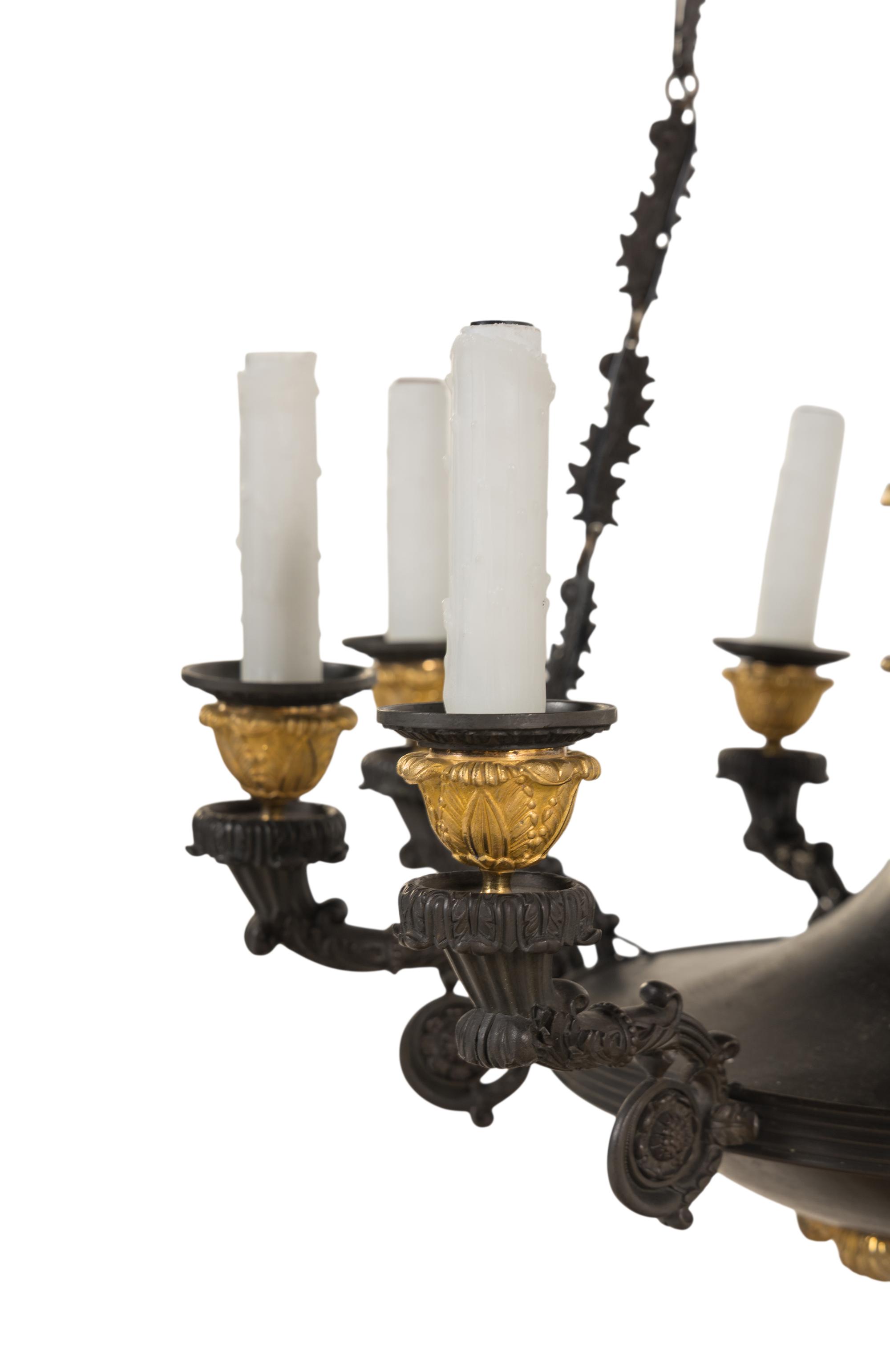 A Restauration Gilt and Patinated Bronze Nine-Light Chandelier