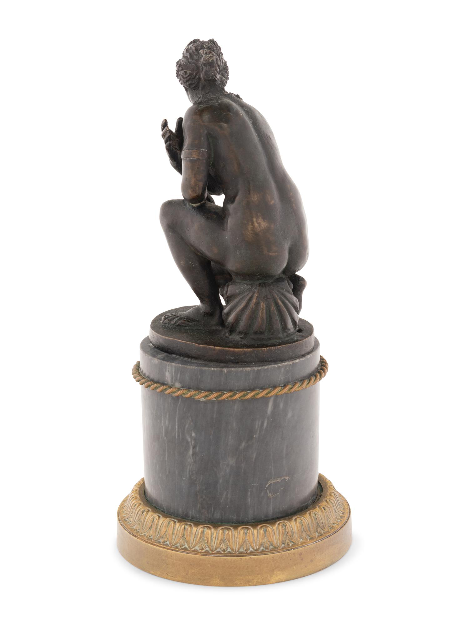 A Continental Bronze Figure of Venus on a Marble Base