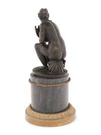 A Continental Bronze Figure of Venus on a Marble Base