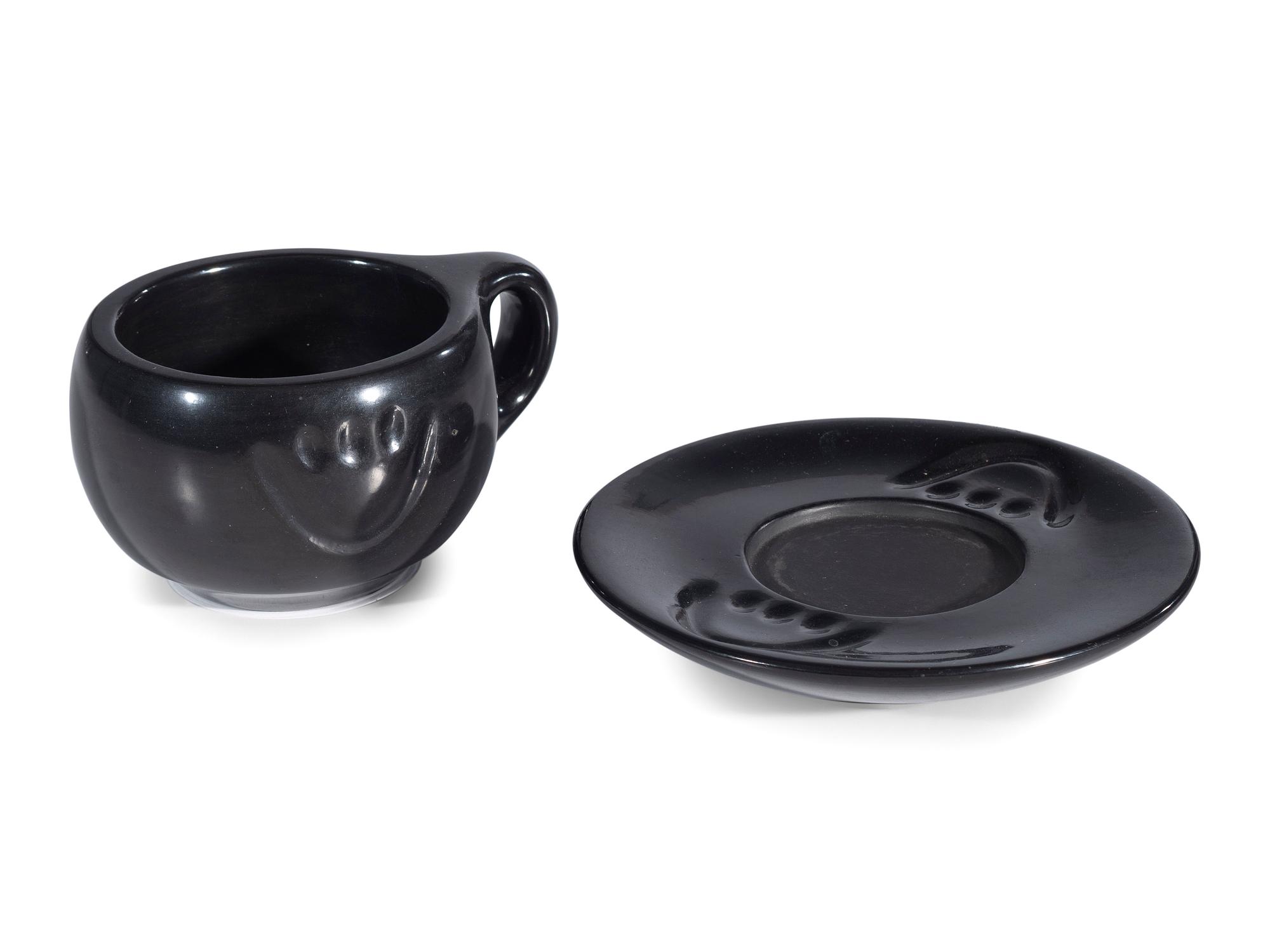 Blackware Pottery Cup and Saucer
