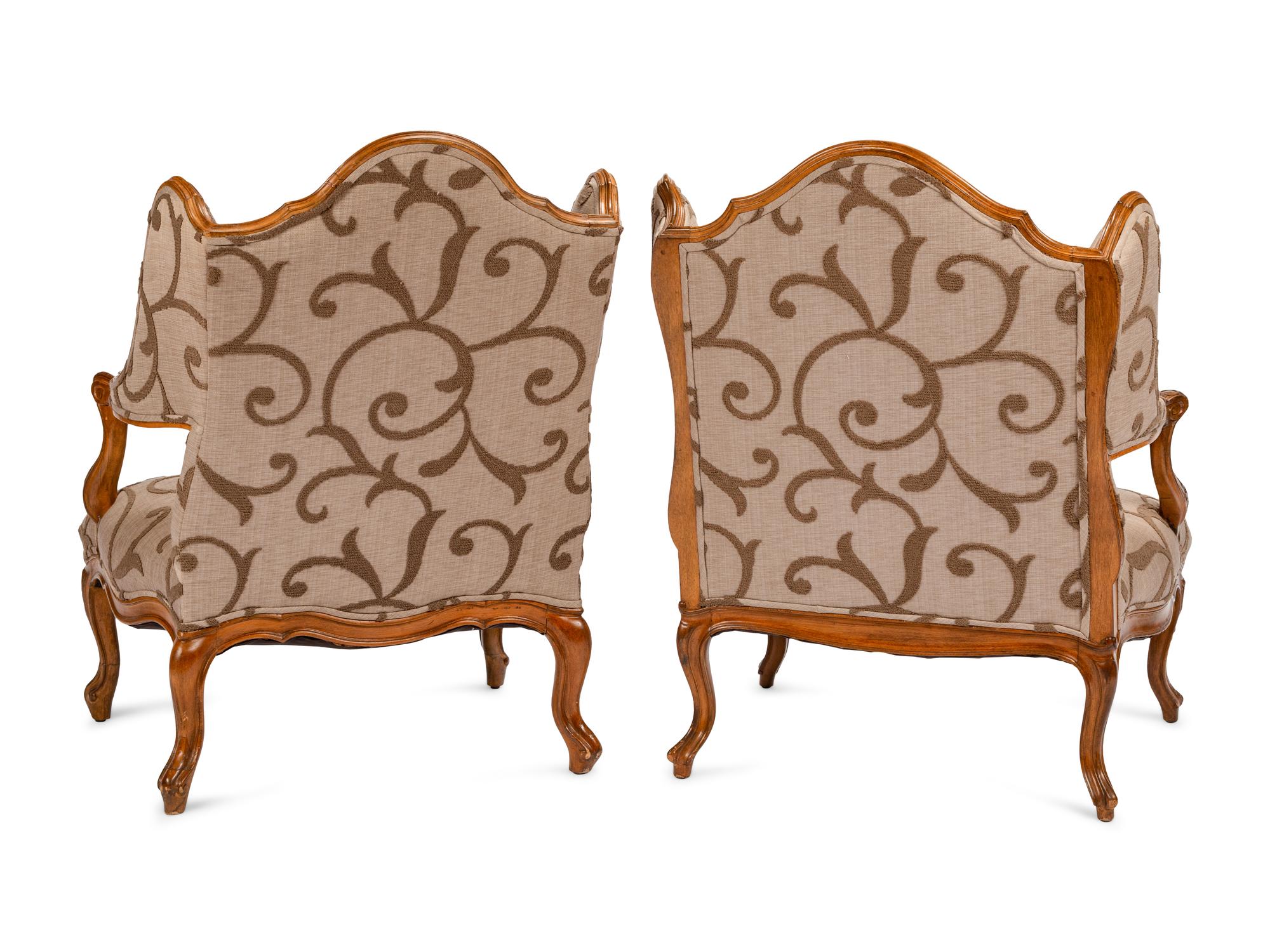 A Near Pair of Régence Style Beechwood Bergères