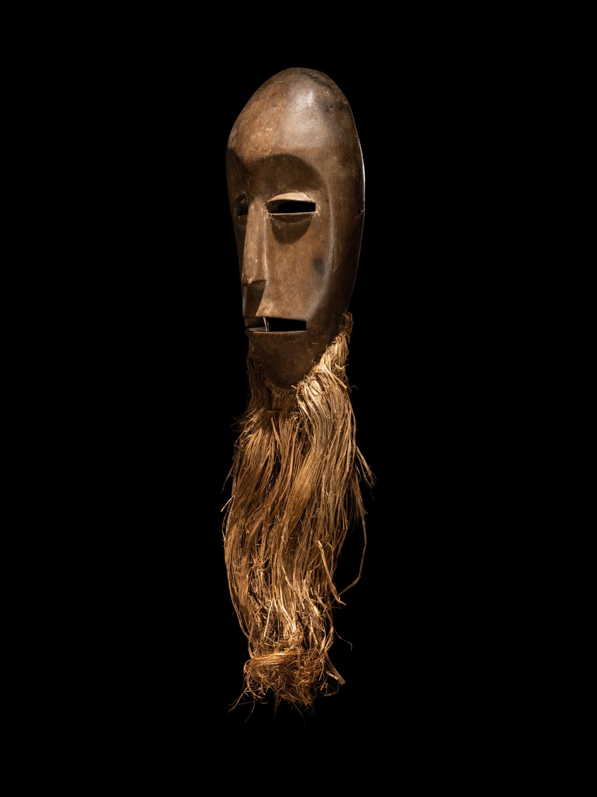 An African Wood Dance Mask With Beard