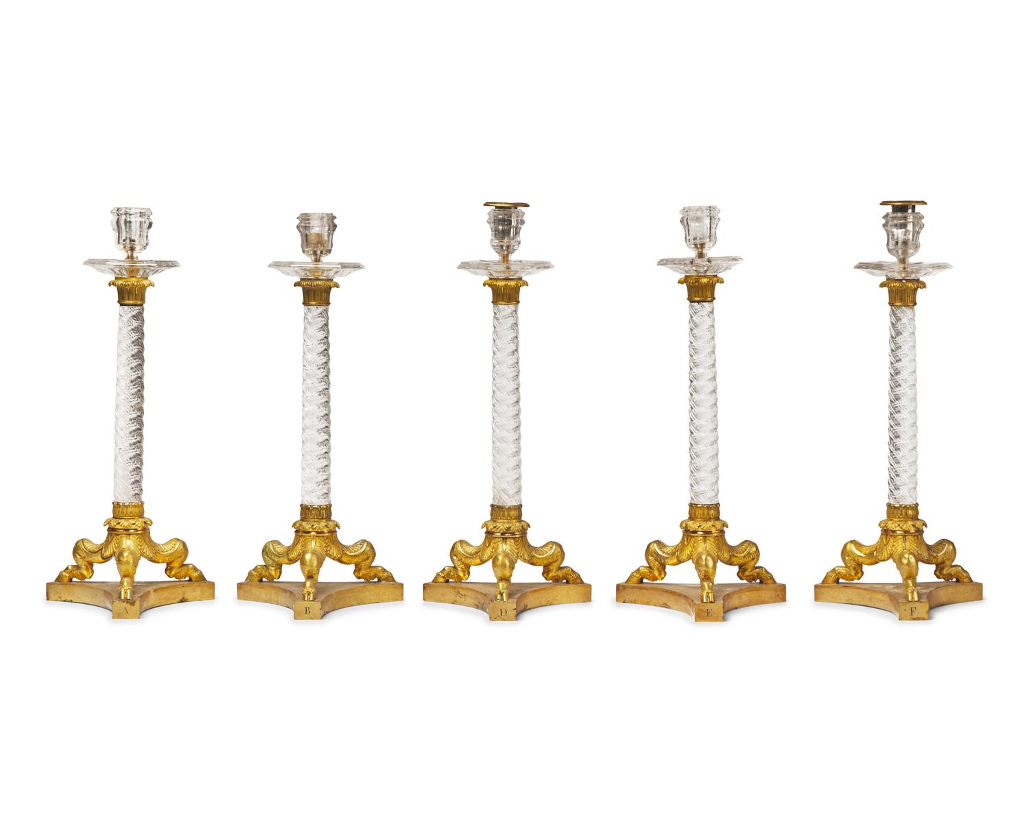 A Set of Five French Restauration Rock Crystal and Gilt-Bronze Candlesticks