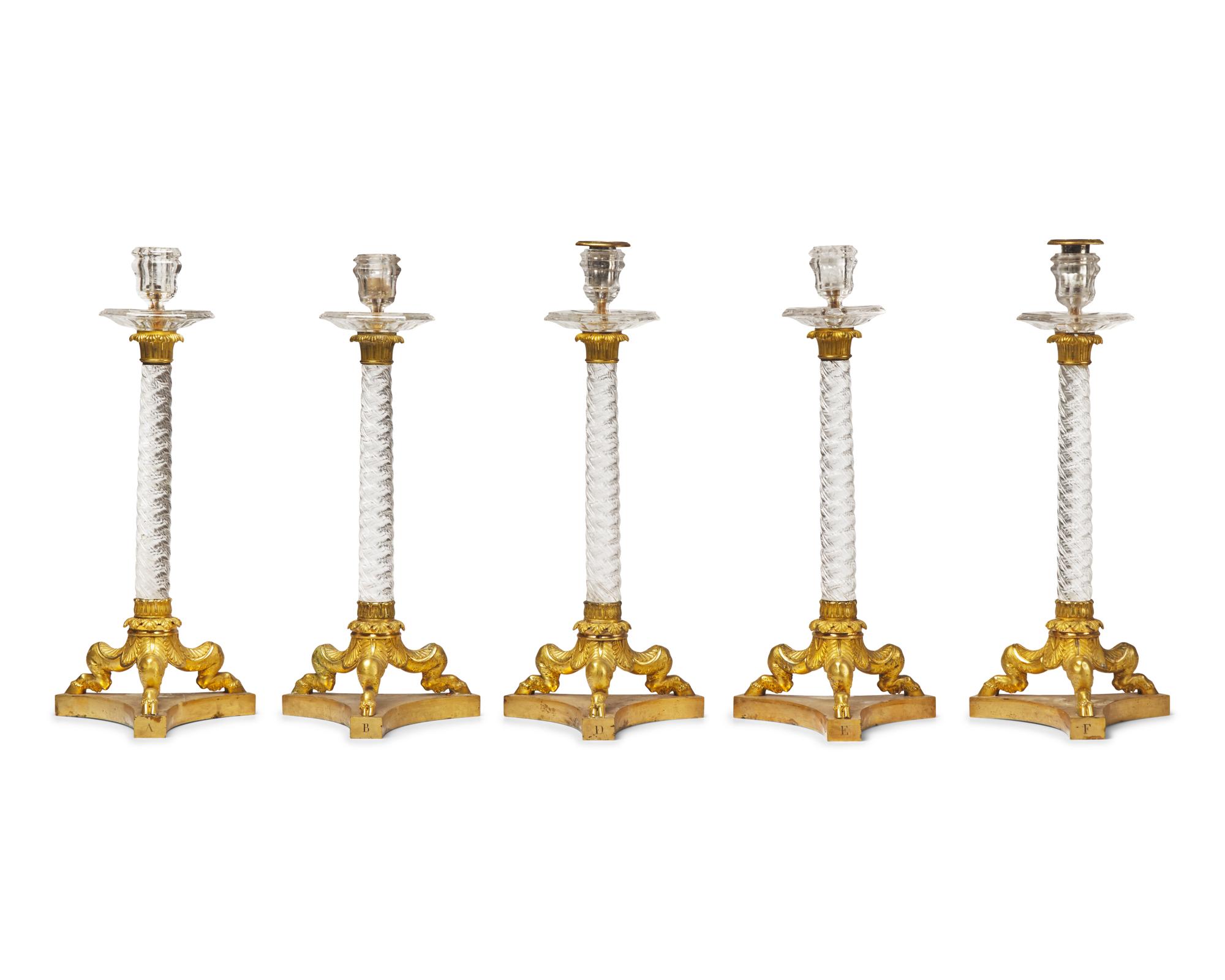 A Set of Five French Restauration Rock Crystal and Gilt-Bronze Candlesticks