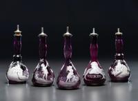 Five 'Mary Gregory' Amethyst Glass Barber Bottles