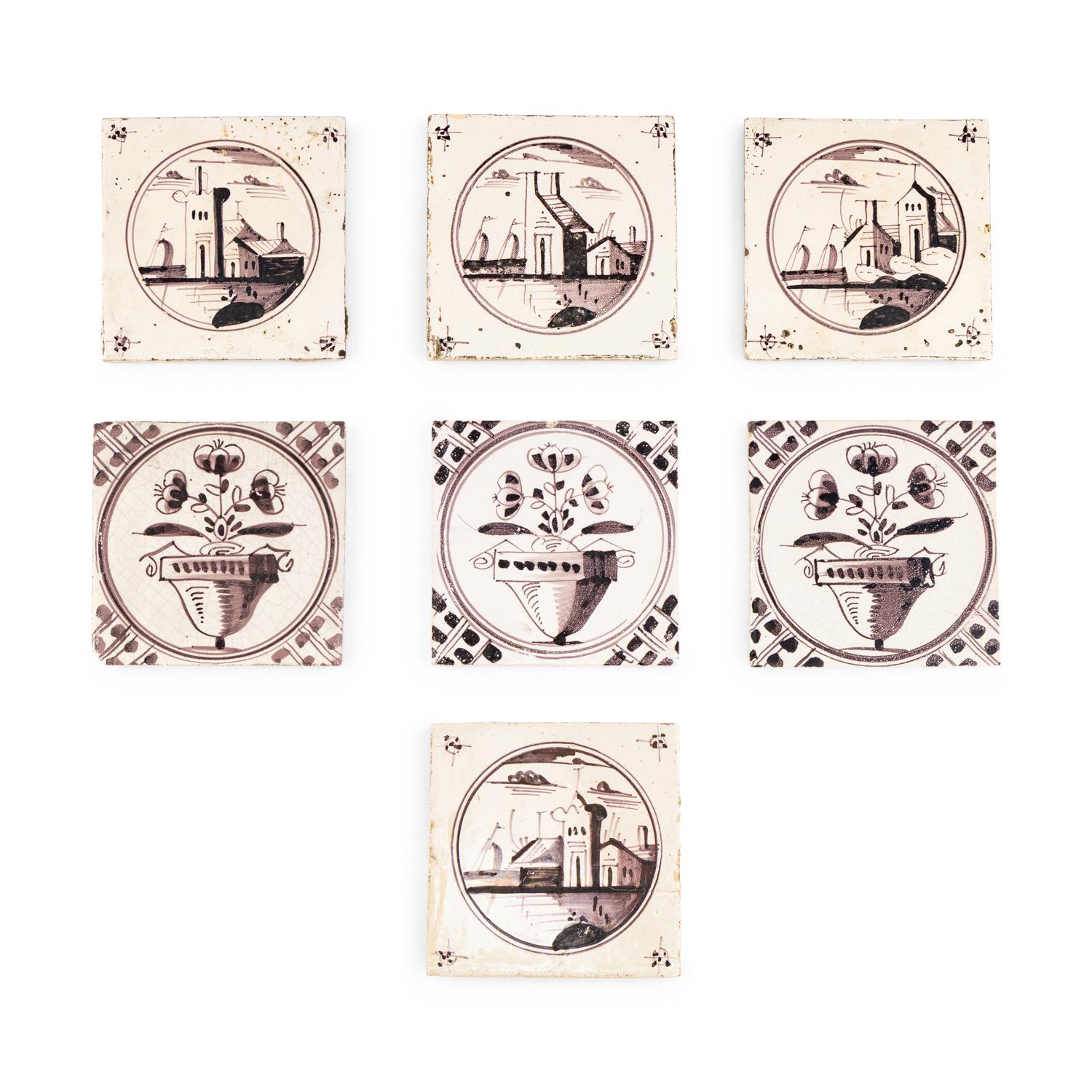 A Collection of Eight Delftware Manganese Decorated Tiles