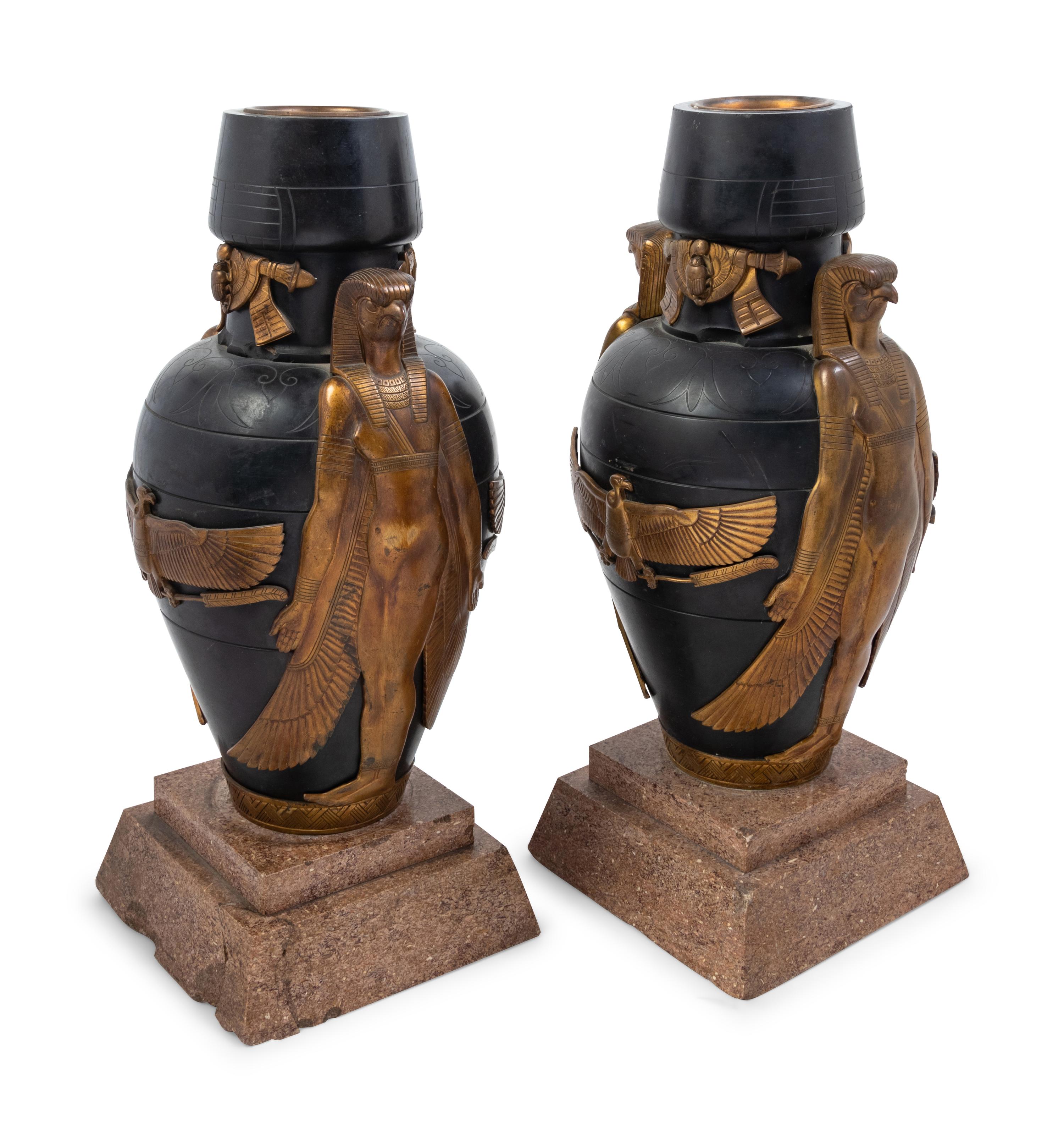 A Pair of French Egyptian Revival Gilt and Patinated Bronze Urns