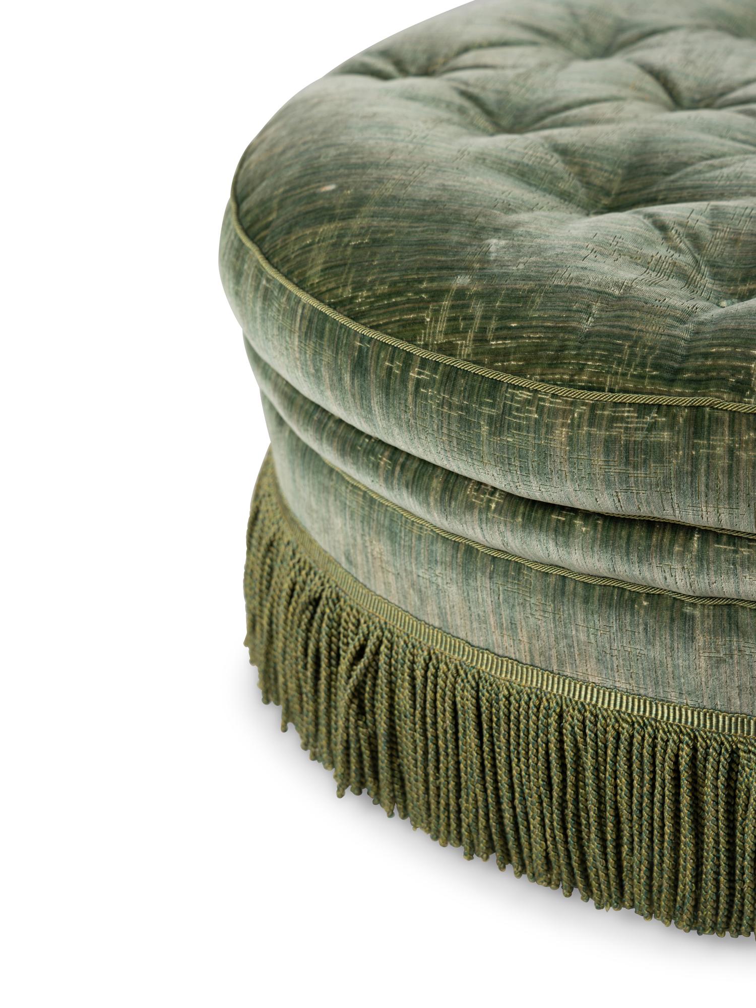 A Button-Tufted Upholstered Ottoman