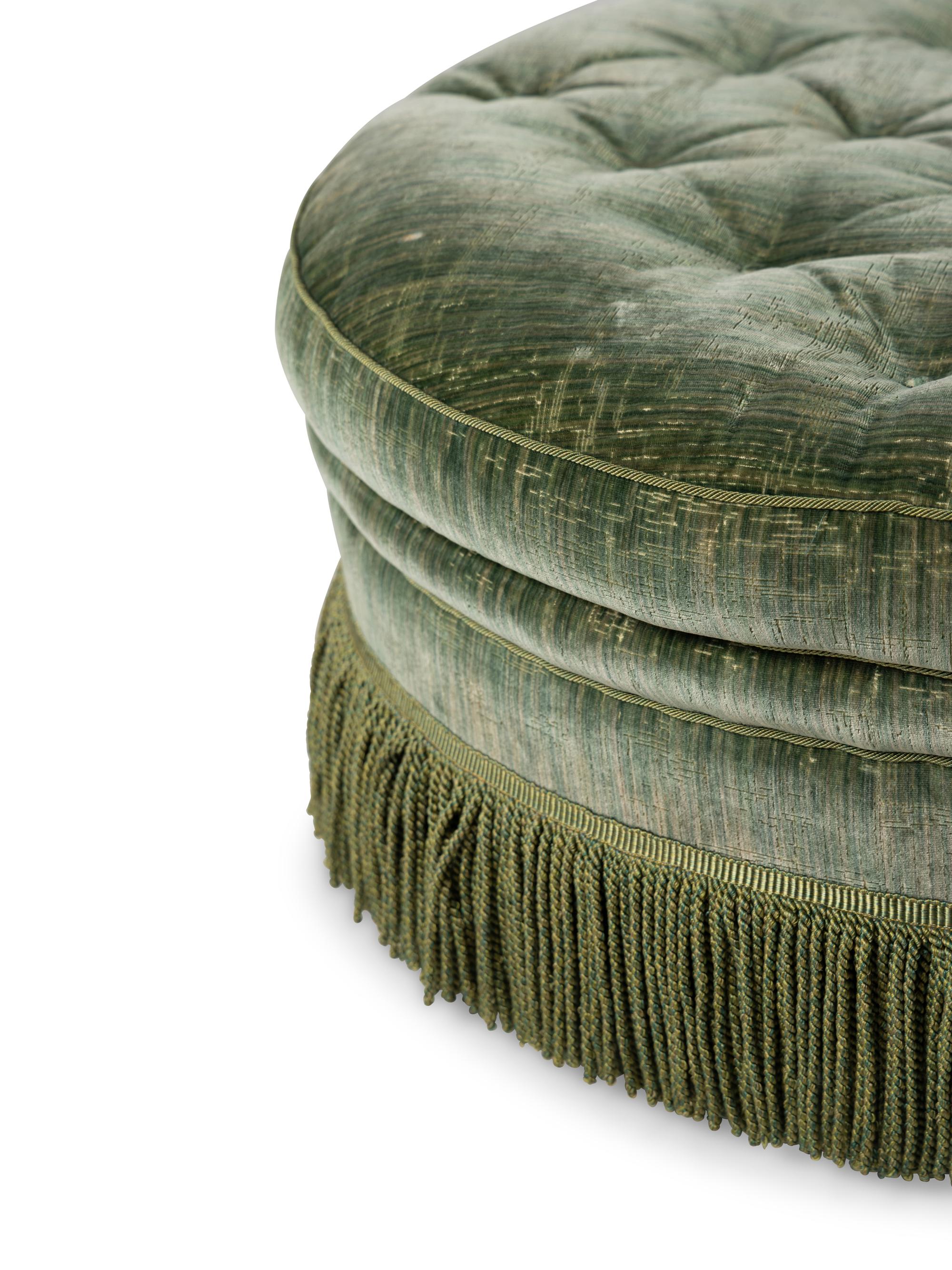 A Button-Tufted Upholstered Ottoman