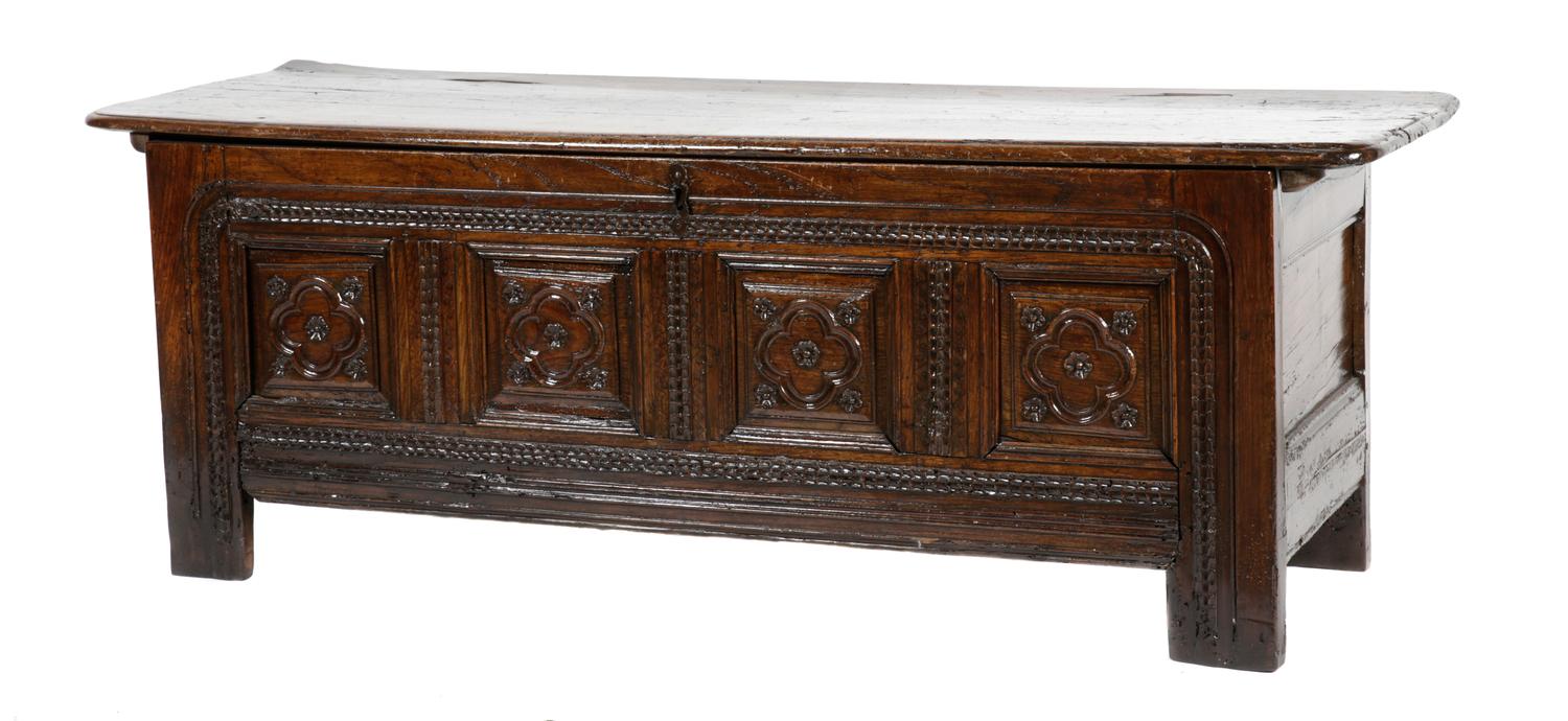 An Italian Oak Cassone Height 26 x width 71 x depth 22 3/4 inches.