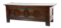 An Italian Oak Cassone Height 26 x width 71 x depth 22 3/4 inches.