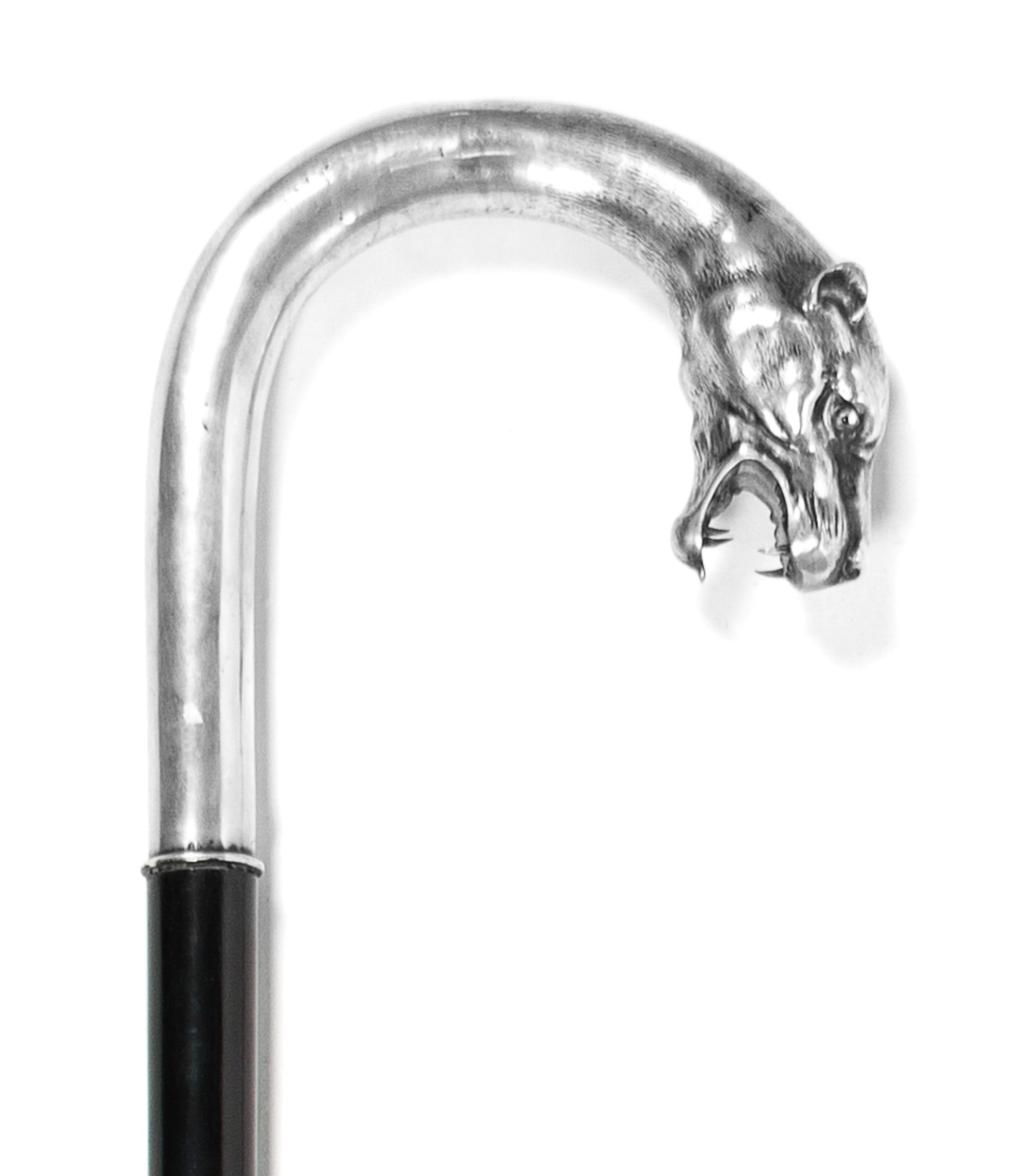 A German Silver Mounted Animalier Cane, Height overall 34 x width of handle 4 3/4 inches.