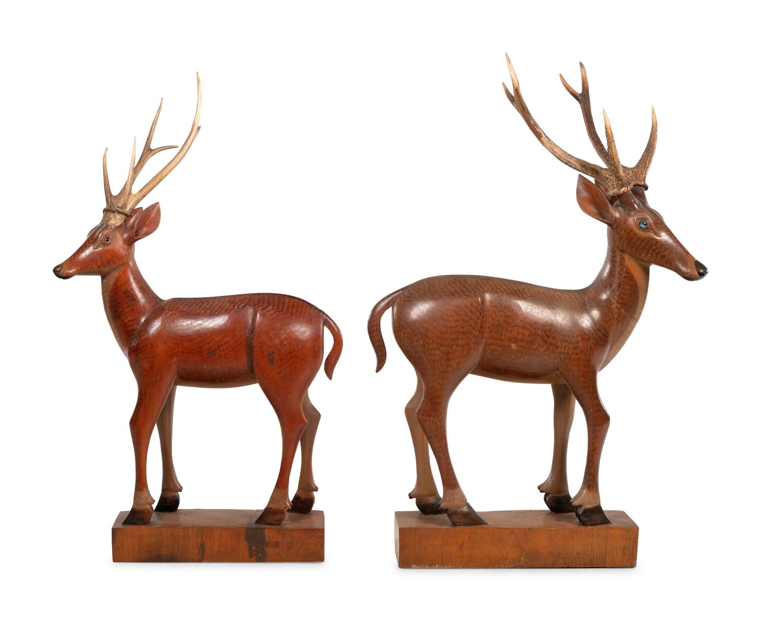A Pair of Carved Fruitwood and Antler Mounted Models of Deer