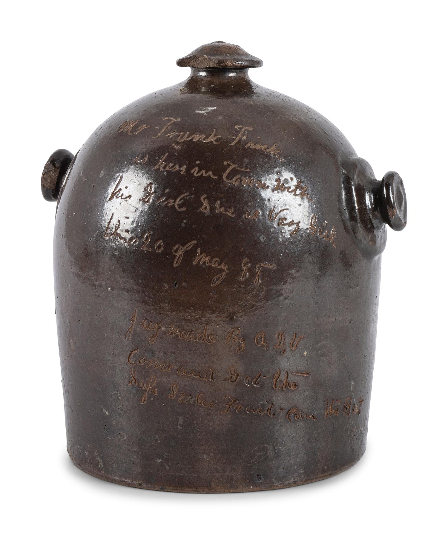 A Scrafitto Incised Albany Slip Stoneware Harvest Jug