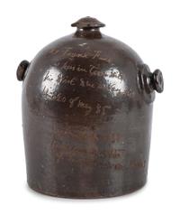 A Scrafitto Incised Albany Slip Stoneware Harvest Jug