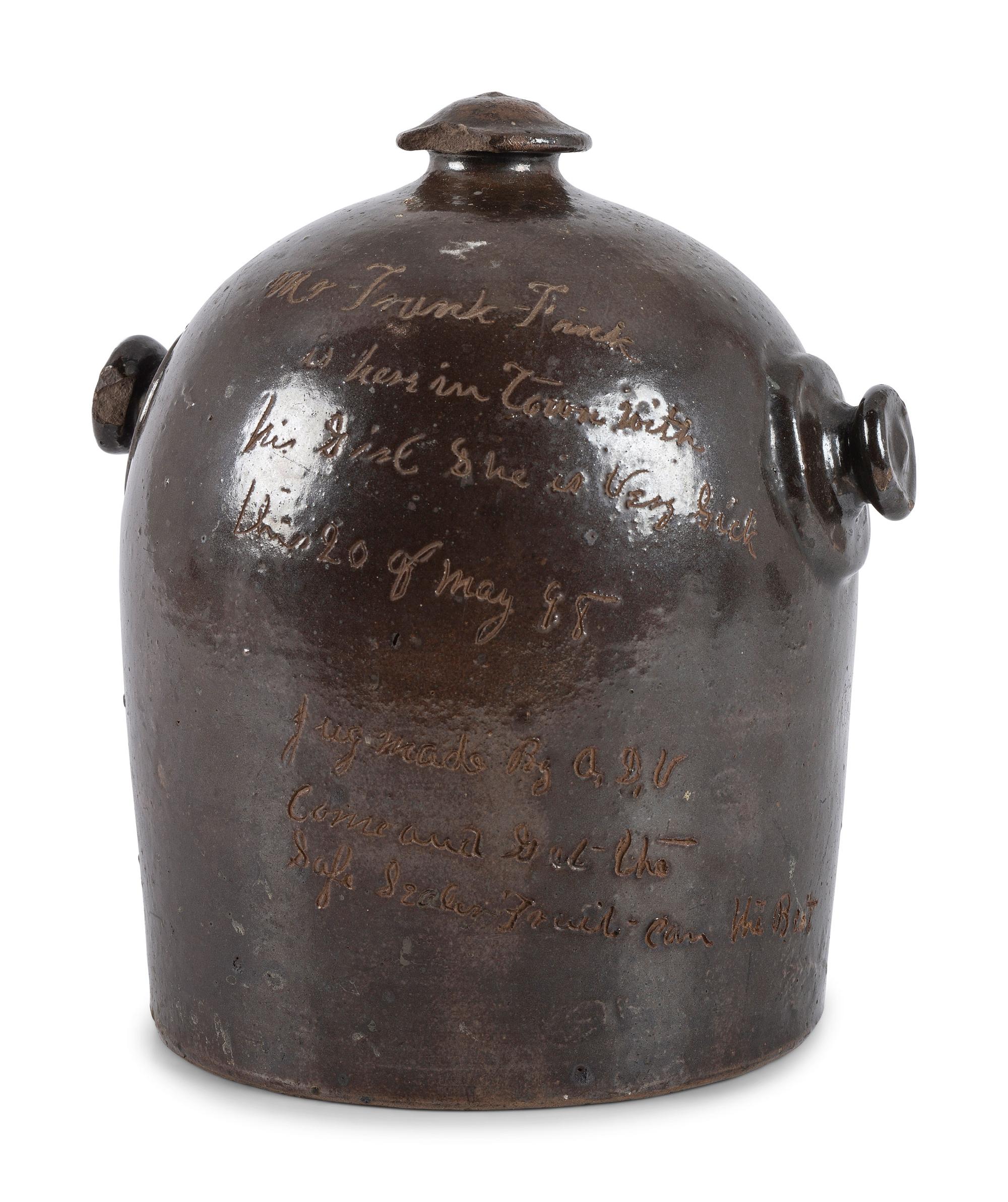 A Scrafitto Incised Albany Slip Stoneware Harvest Jug