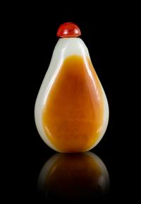 A Glass Imitating Celadon and Russet Jade Snuff Bottle Height 2 3/4 inches.
