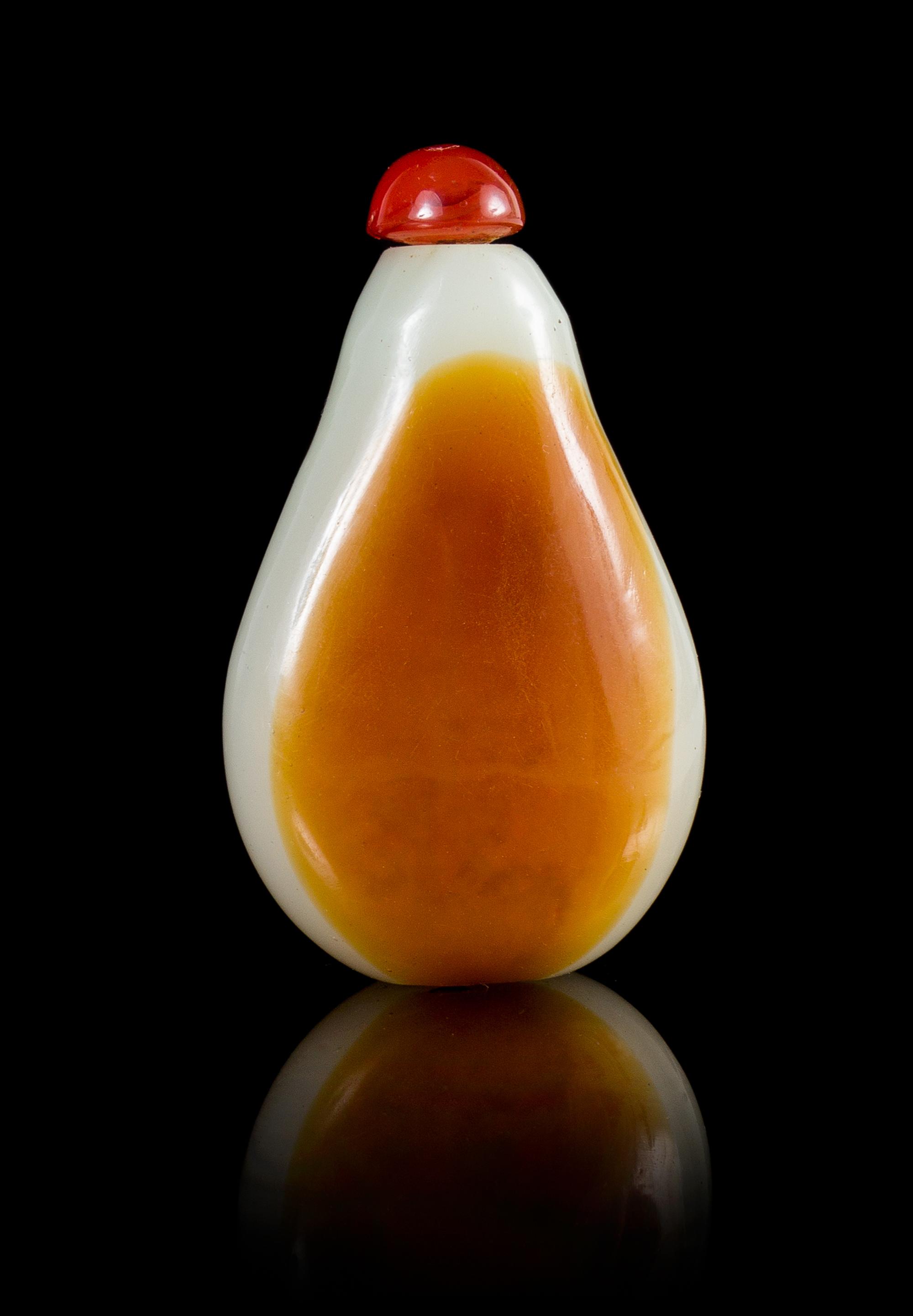 A Glass Imitating Celadon and Russet Jade Snuff Bottle Height 2 3/4 inches.
